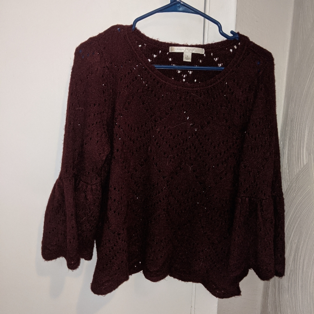 Red bell sleeved sweater